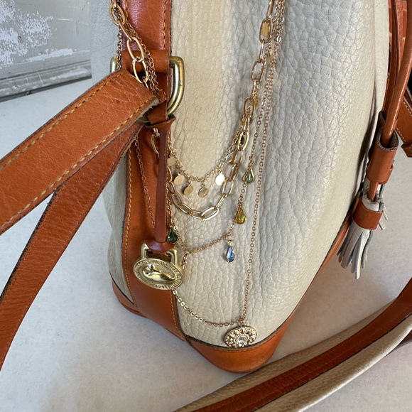 Dooney & Bourke Cream and Tan Leather Bucket Bag - Picture 9 of 11